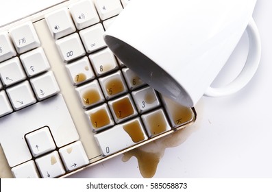 Spilled Coffee On Computer Keyboard