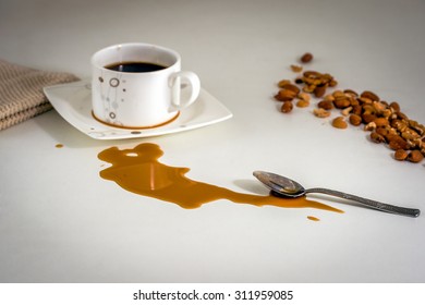 Spilled Coffee Stain On The Table During The Breakfast.