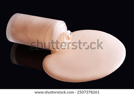 Spilled Liquid foundation. Mockup glass bottle of foundation cosmetic product                               