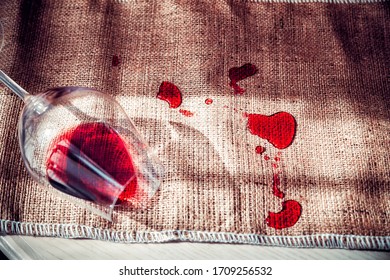 Spilled Red Wine On The Table