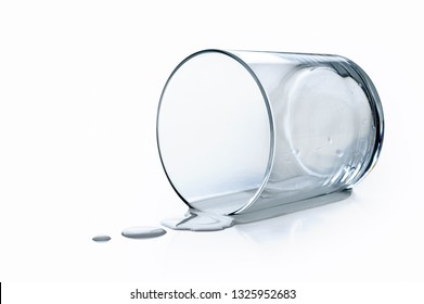 Spilled water glass with white background