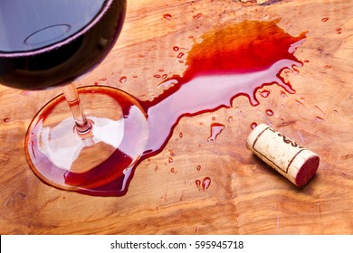 Spilled Wine On A Olive Wood Table