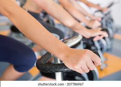 Spin Class Working Out In A Row At The Gym