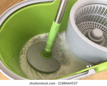 Spin Floor Mop in Bucket with soap - Powered by Shutterstock