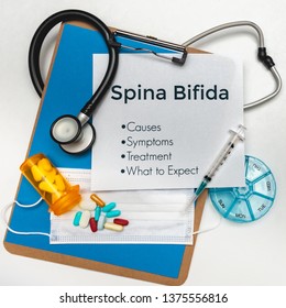 Spina Bifida Finding A Cure. Spina Bifida Causes, Symptoms, Treatment And What To Expect. Medical Diseases On A Clipboard.