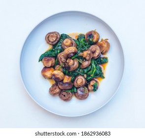 Sautéed Spinach And Button Mushrooms