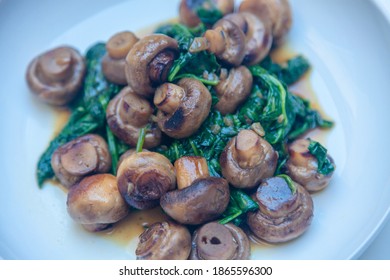 Sautéed Spinach And Button Mushrooms