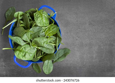 Spinach Colander, Over Dark Slate.