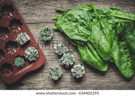 Similar – Image, Stock Photo Spinach farm. Organic spinach leaves on the field.