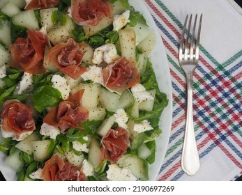 Spinach, Melon And Jamon Salad, Vintage Silver Fork. View From Above.