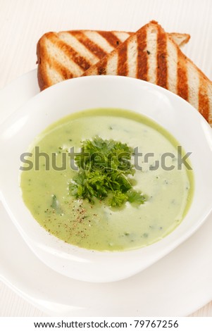 Similar – Image, Stock Photo Spinach soup bowl with walnuts. Healthy food