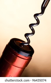 A Spindle Of A Cork Screw In The Cork Of A Wine Bottle