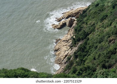 Spindrift and rocks by the sea, photo in Taizhou, Zhejiang, China. - Shutterstock ID 2207511529