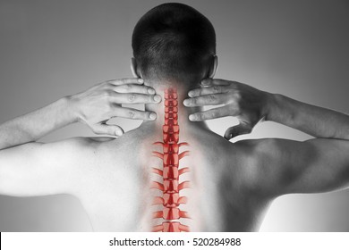 Spine Pain, Man With Backache And Ache In The Neck, Black And White Photo With Red Backbone On Gray Background