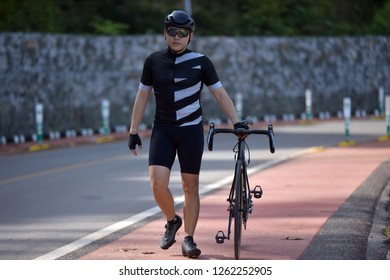 Spinner With His Bike.