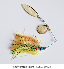 Spinnerbait ,a Metal Lure Object On Background.