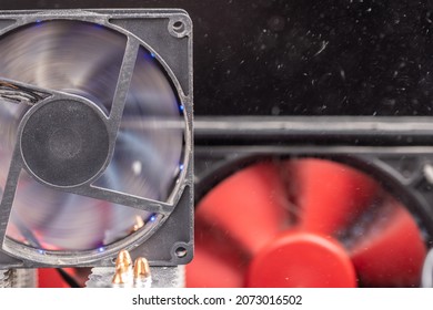 Spinning 90 Mm Pc Fan Close-up With Thick Layer Of Dust And Flying Airborne Dust Particles - Computer Case Maintenance Background