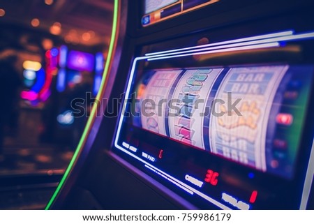 Spinning Drums of Slot Machine Inside the Casino. Modern Digital One Handed Bandit Game.