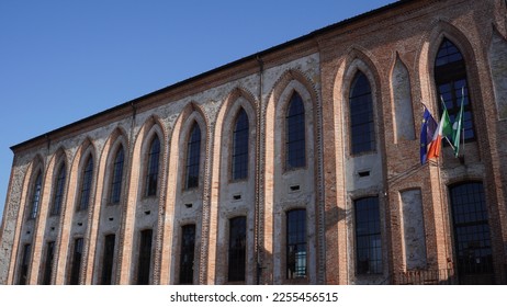 Spinning mill, industrial late medieval building. Lombard neo-Gothic style, built in 1872. Located in Martinengo (Bergamo province). Winter shots - Shutterstock ID 2255456515