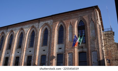 Spinning mill, industrial late medieval building. Lombard neo-Gothic style, built in 1872. Located in Martinengo (Bergamo province). Winter shots - Shutterstock ID 2255456519