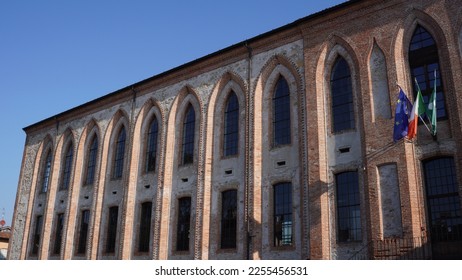 Spinning mill, industrial late medieval building. Lombard neo-Gothic style, built in 1872. Located in Martinengo (Bergamo province). Winter shots - Shutterstock ID 2255456531