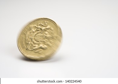 A Spinning Pound Coin