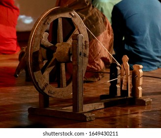 A Spinning Wheel Charkha Is A Device For Spinning Thread Or Yarn From Fibres