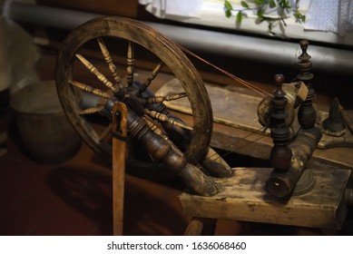 Spinning wheel spoke wheel spindle on wooden antique spinning machine - Powered by Shutterstock