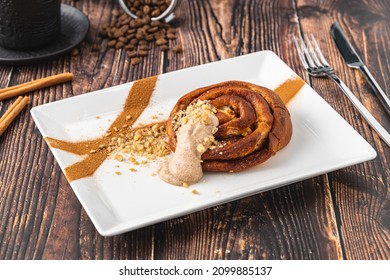 Spiral Apple Cake Or Muffin With Cup Of Fresh Coffee On Wooden Background