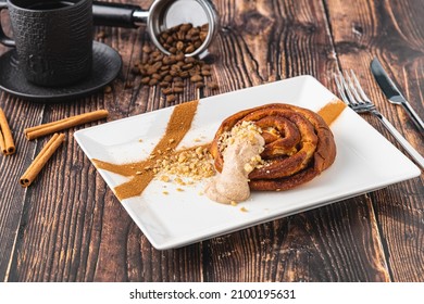 Spiral Apple Cake Or Muffin With Cup Of Fresh Coffee On Wooden Background