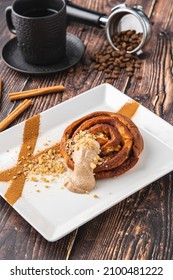 Spiral Apple Cake Or Muffin With Cup Of Fresh Coffee On Wooden Background