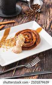 Spiral Apple Cake Or Muffin With Cup Of Fresh Coffee On Wooden Background