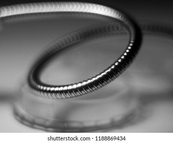 Spiral cable twisted into a loop with bokeh