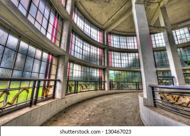 Spiral corridor with large canopy in abandoned sanatorium - Powered by Shutterstock