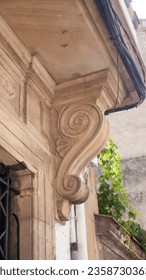 Spiral ornamented support in old house balcony