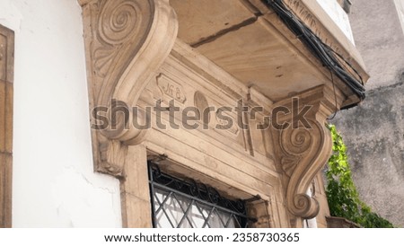 Spiral ornamented support in old house balcony