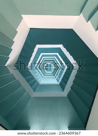 Spiral pattern formed by the stairs as seen from top-view of a lighthouse in Pondicherry, India