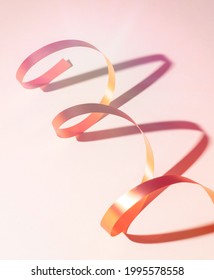 Spiral ribbon on white background with shadow 