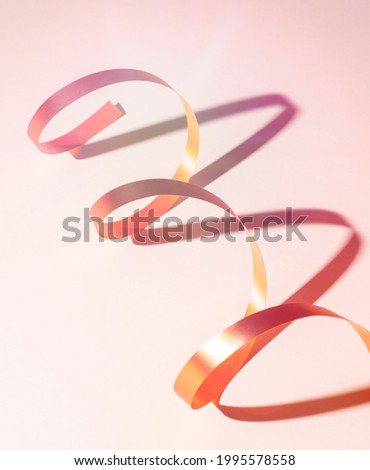 Spiral ribbon on white background with shadow 