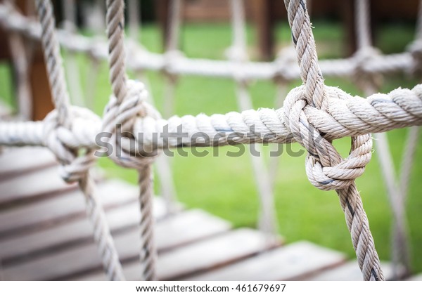Spiral rope bridge for\
children to play.