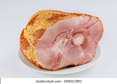 Spiral Sliced Whole Ham Isolated On White Background. Close Up.