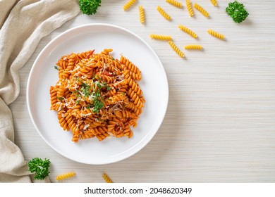 spiral or spirali pasta with tomato sauce and cheese - Italian food style