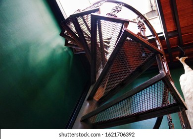 Spiral Staircase. Close Up View Of Steel Spiral Staircase. Worm Eye View Structure Of The Steel Spiral Staircase. The Stairs To The Attic.