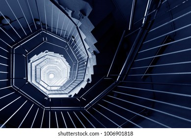 Spiral staircase in dark Stock Photo