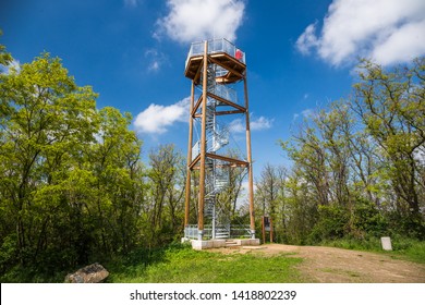 Spiral staircase of lookout tower, wooden construction with metal steps. Observation tower, place from which to keep watch or view landscape. Bedrichova vyhlidka - Czech republic. - Powered by Shutterstock