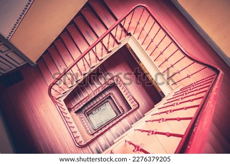 Spiral staircase in an old house top down view