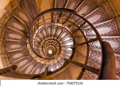 Spiral stairs inside Arc de triomphe in Paris France - travel and architecture background