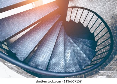 Spiral steel staircase circular staircase decoration interior. travel and architecture background.spiral staircase dark color