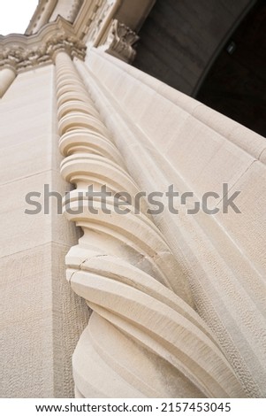 Spiral-shaped marble column of an ancient Italian classical church - Italy