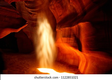 Spirit Of Antelope Canyon. Sand Caught In The Sunlight Or A Native Spirit Guiding Me Through The Canyon. I Prefer To Think Of It As My Spirit Guide.